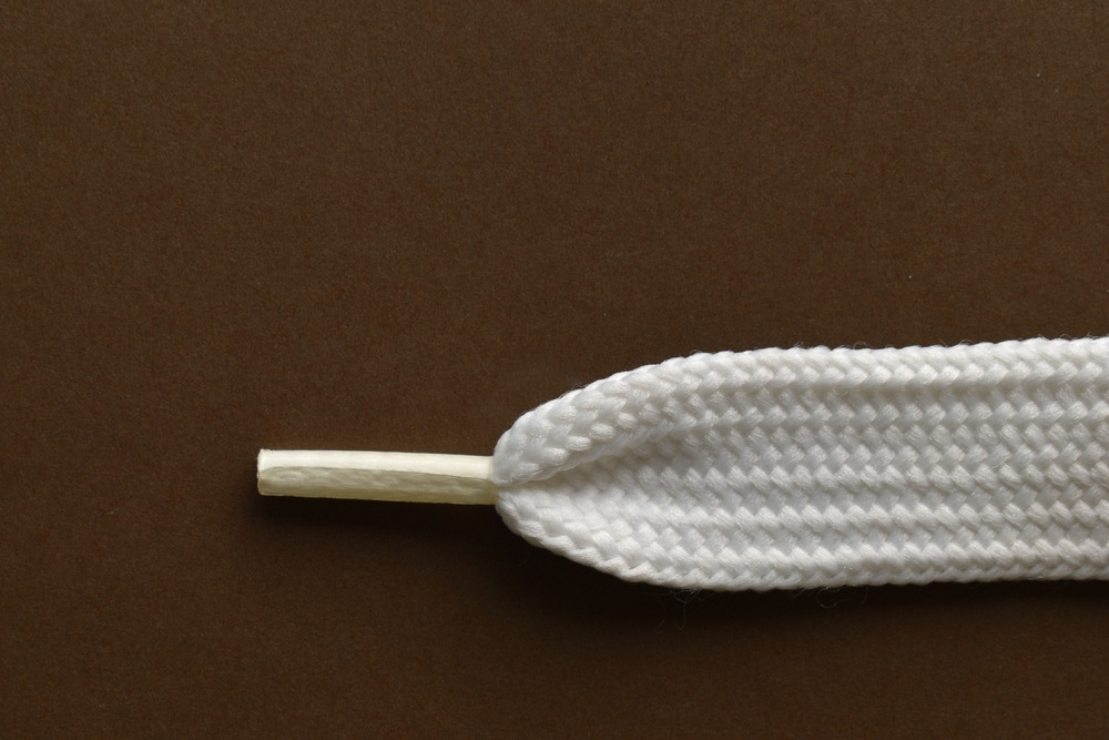 Die Geschichte der Aglets: Kleine Details, die bei Ihren Schnürsenkeln den Unterschied machen